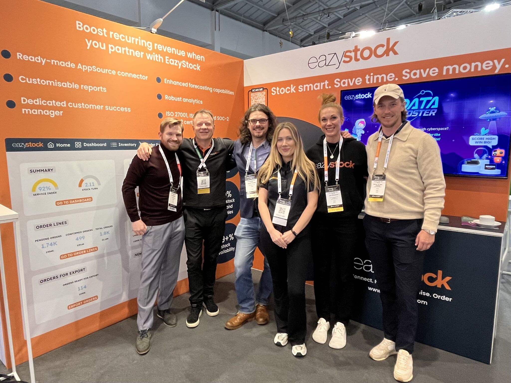 EazyStock team at a trade show booth showcasing inventory management software