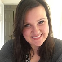 Smiling woman portrait indoors with natural light