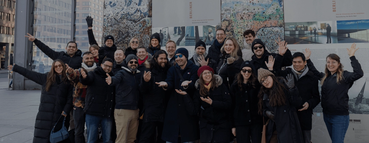 Global Tandem.net team group photo outdoors during a company trip in Berlin